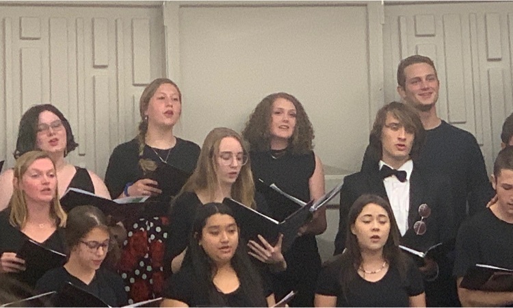 Kayleigh singing soprano