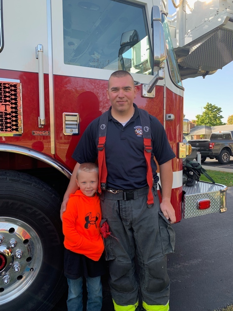 kid with fireman