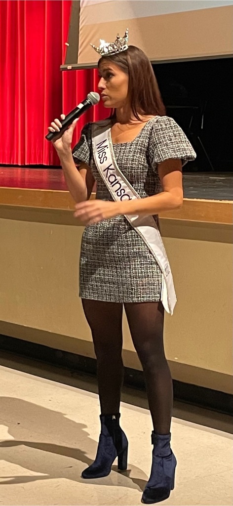 Miss Kansas stands in front of the EHS stage