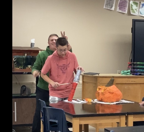 Jackson and Hadyn enjoying paper mache art!
