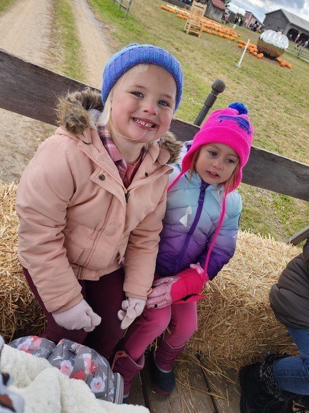 2 girls on a hayride