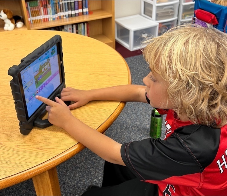 child with iPad