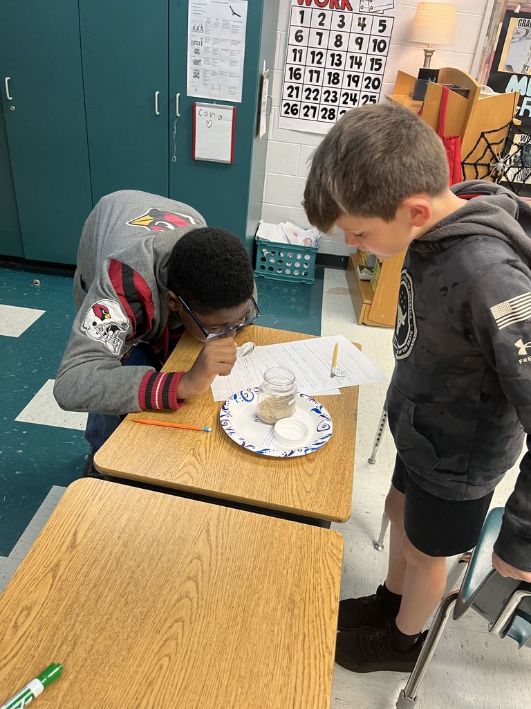 Children studying geology