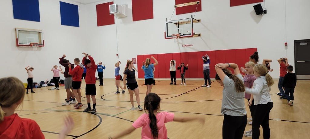 HS Cross Country Team helping with warm-ups. 