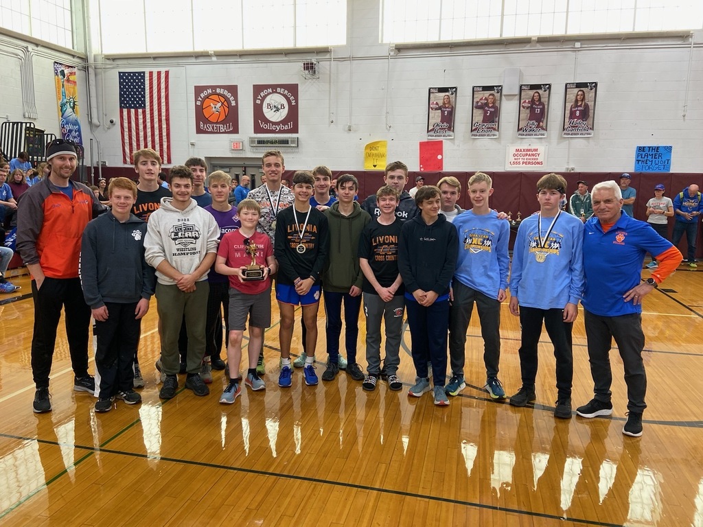 Cross Country team with trophy