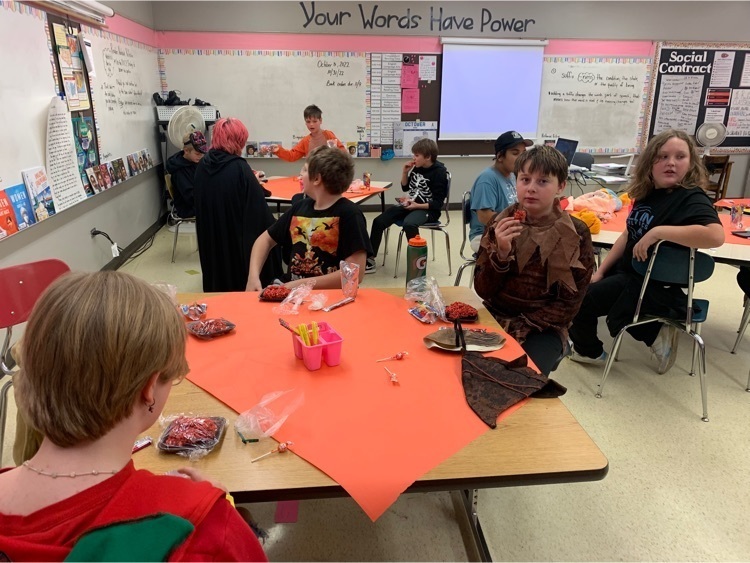 children eating Halloween treats 