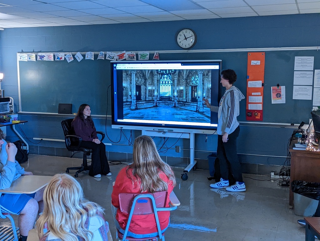 Acting out a scene from Act 1.