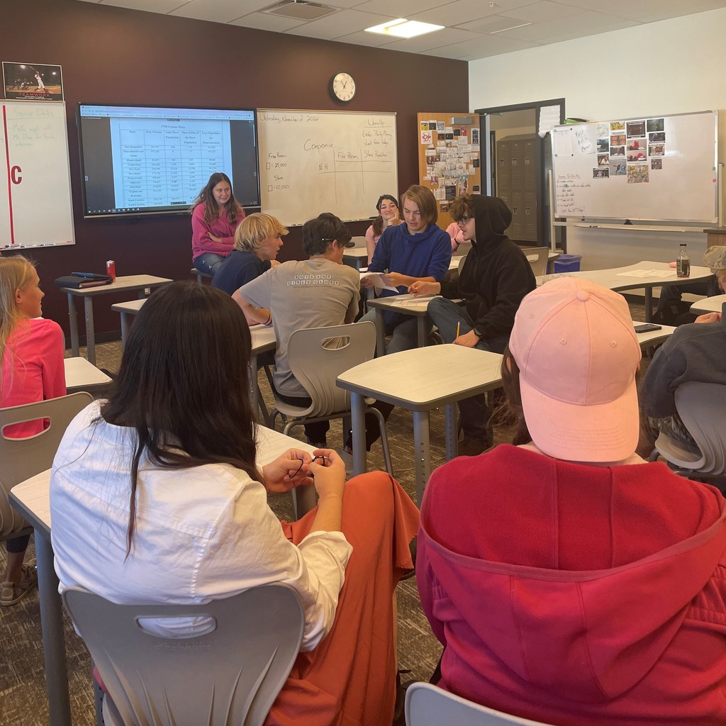 Civics students act out the legislative process as state representatives