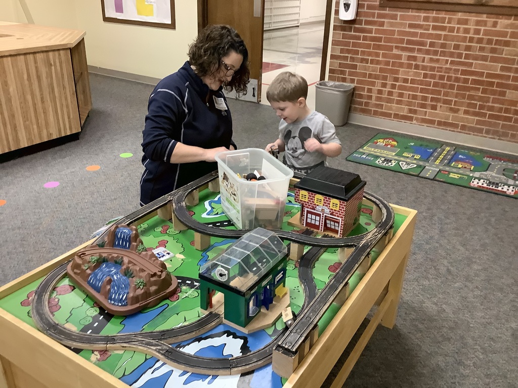 Parent and child playing together at Shull