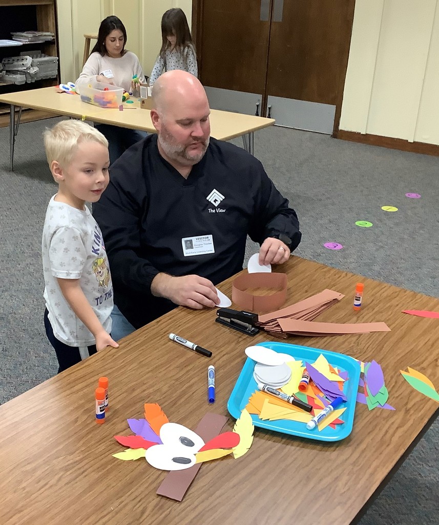 Parent and child playing at Shull