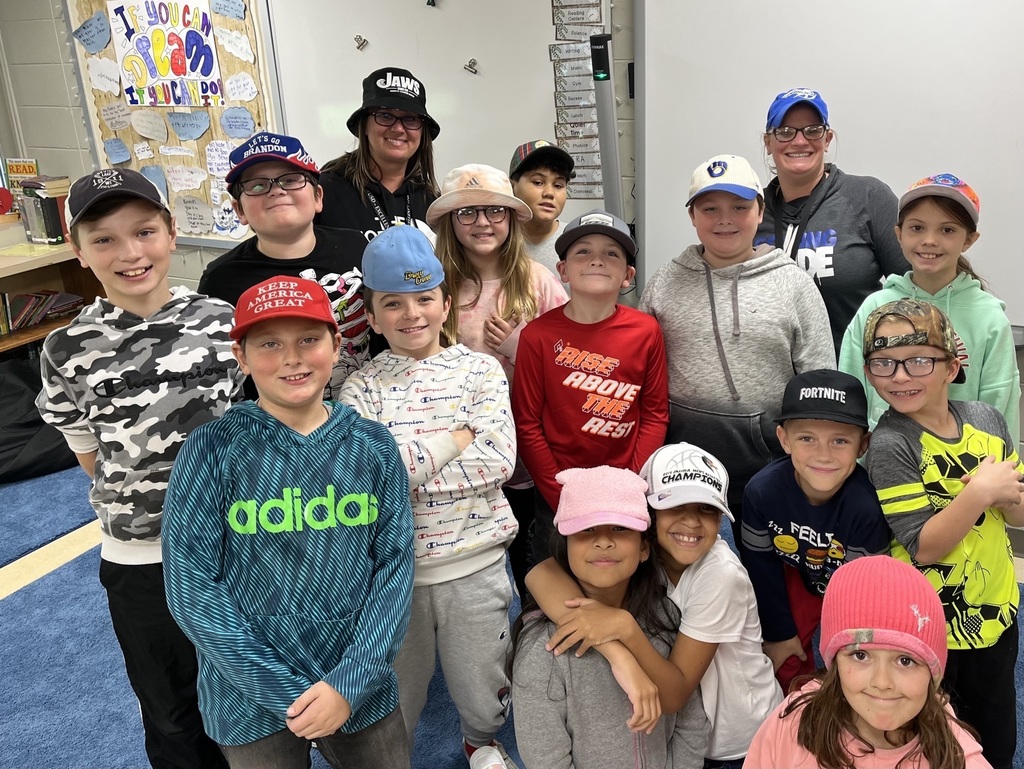 a group of students wearing hats