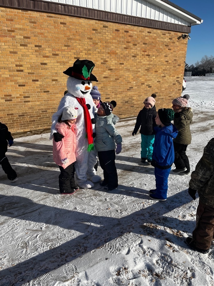 photo of Frosty and student hugs