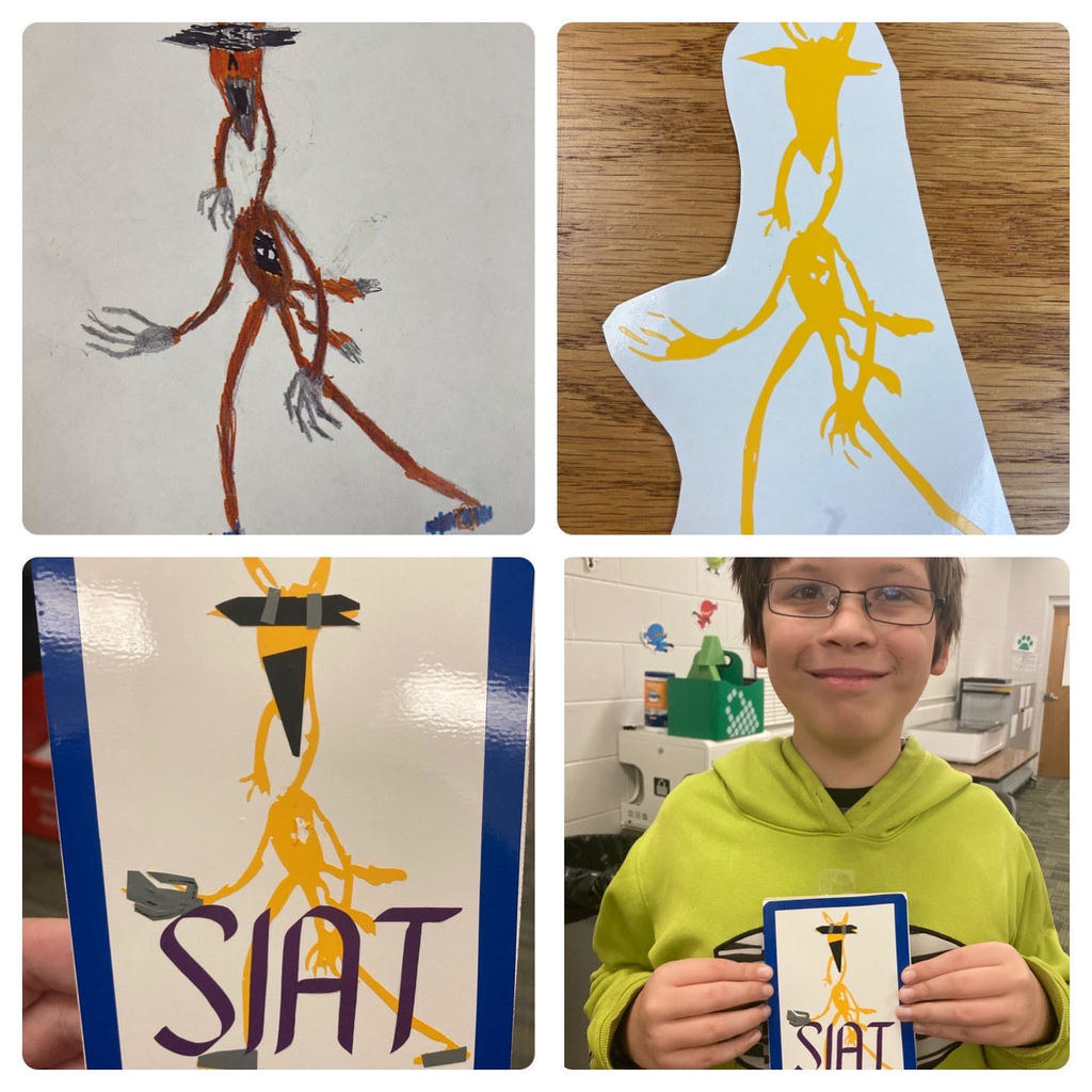 Kevin and Siat on the sign he created in the Florence Elementary Maker Space