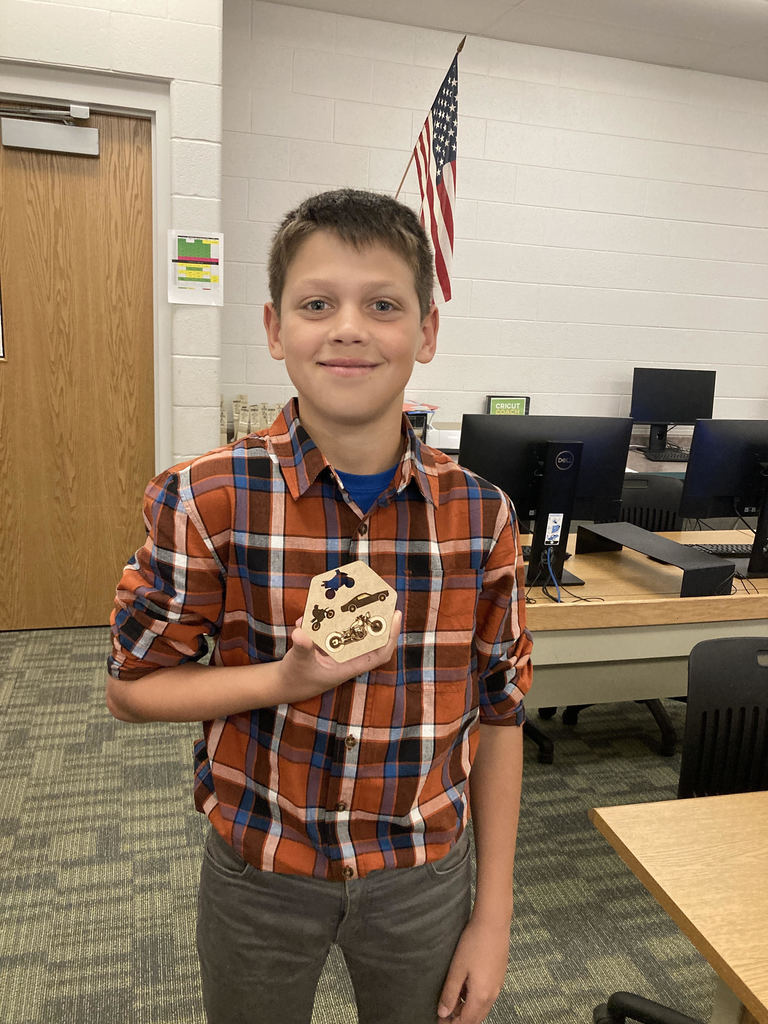 Logan McCoy and his finished laser engraved coaster