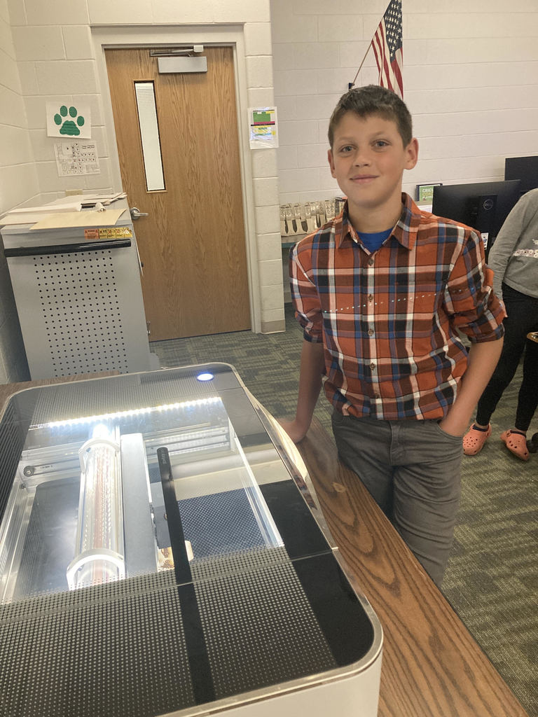 Logan McCoy with the Glowforge Laser Engraver