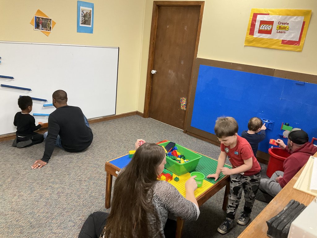 Parents and children playing together