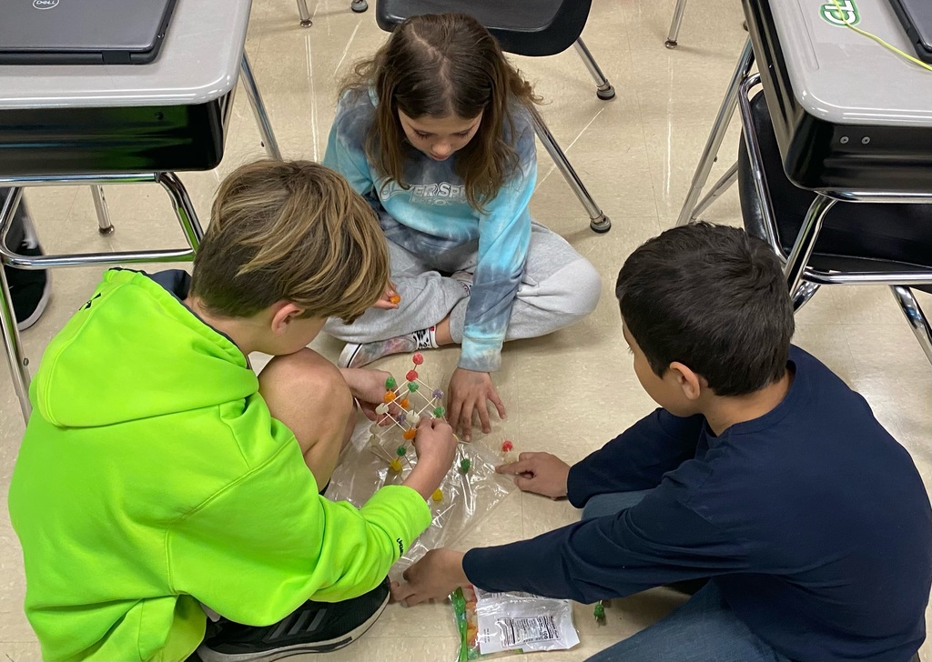 Students building a tower