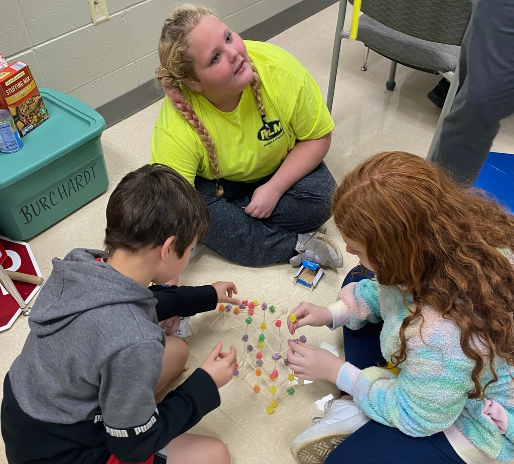 Students building a tower