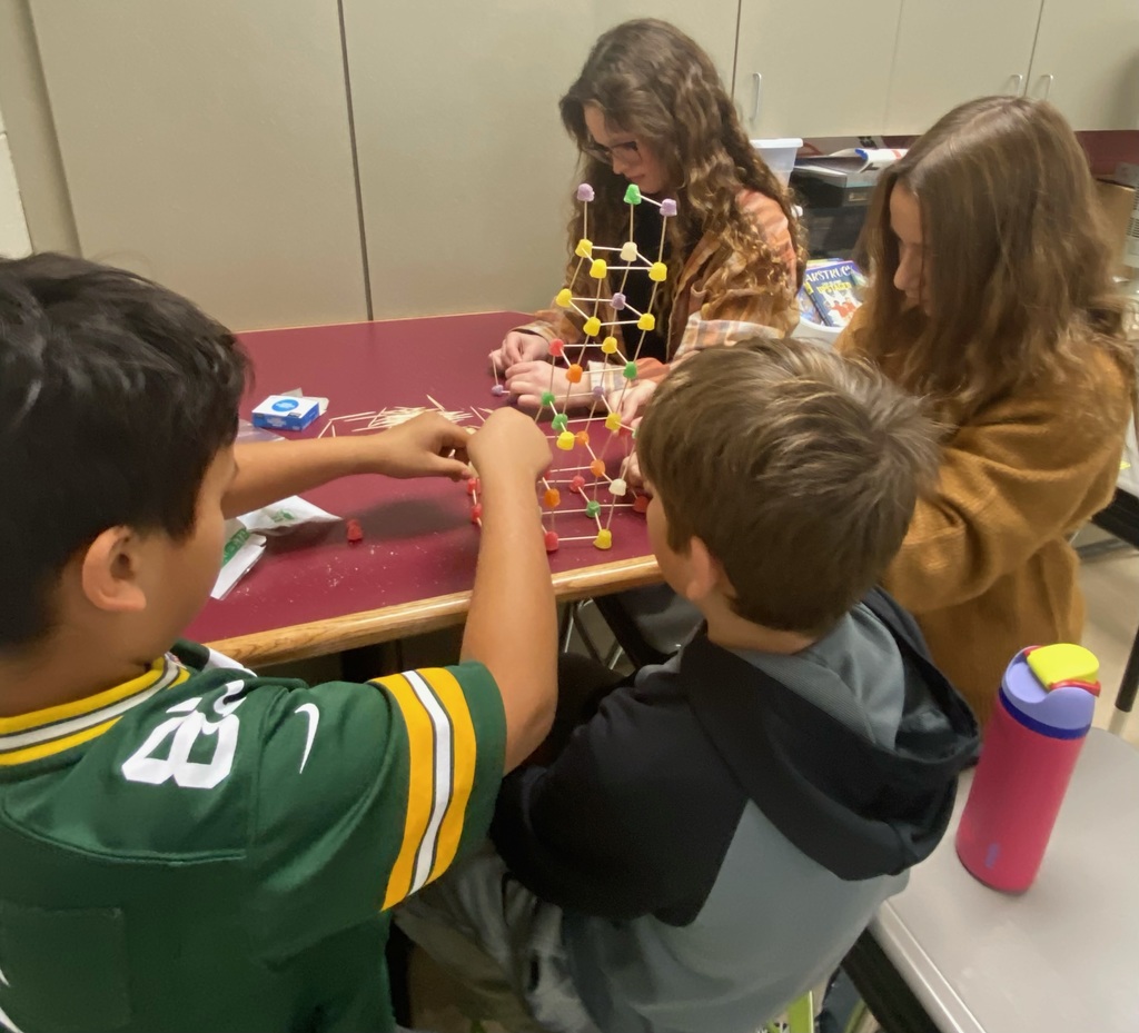 Students building a tower