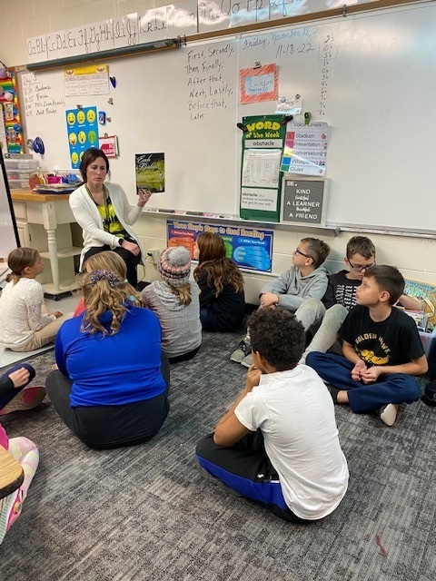 Mrs. Foster reading at West