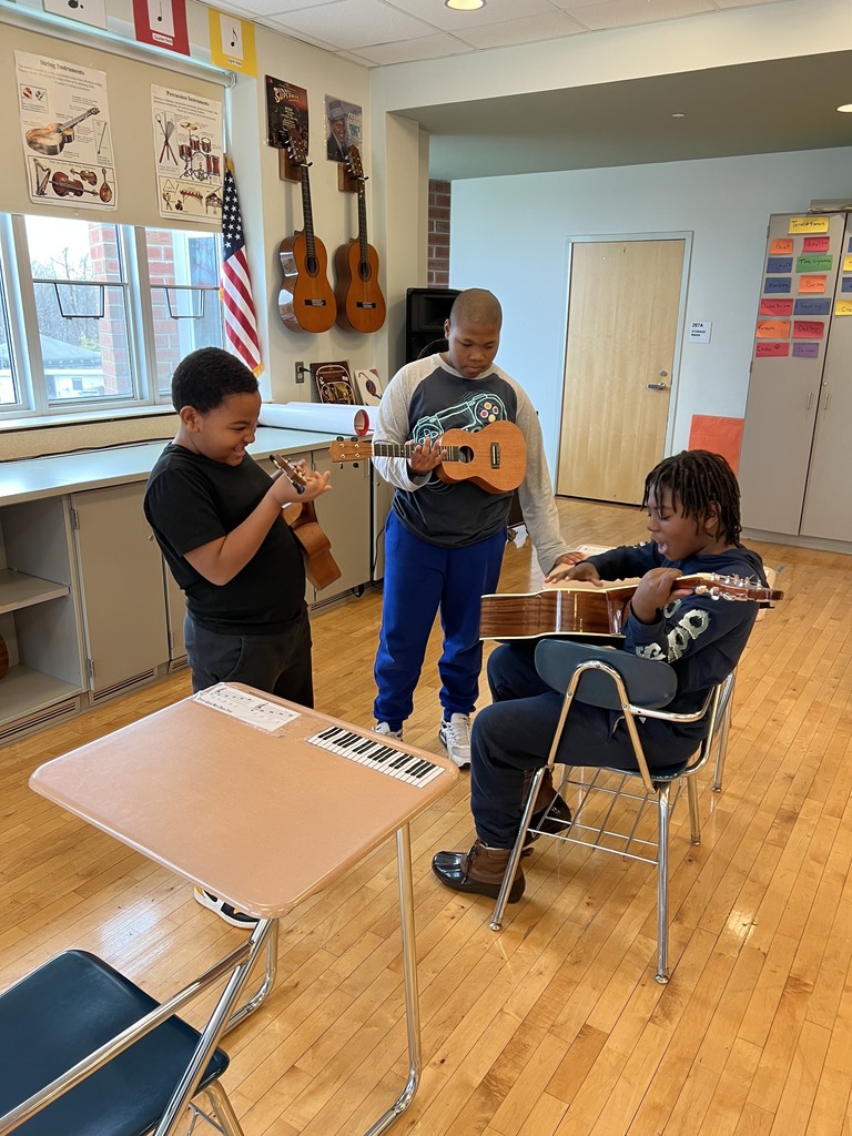 Three students with instruments
