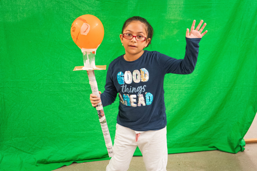 Child showing off her balloon creation