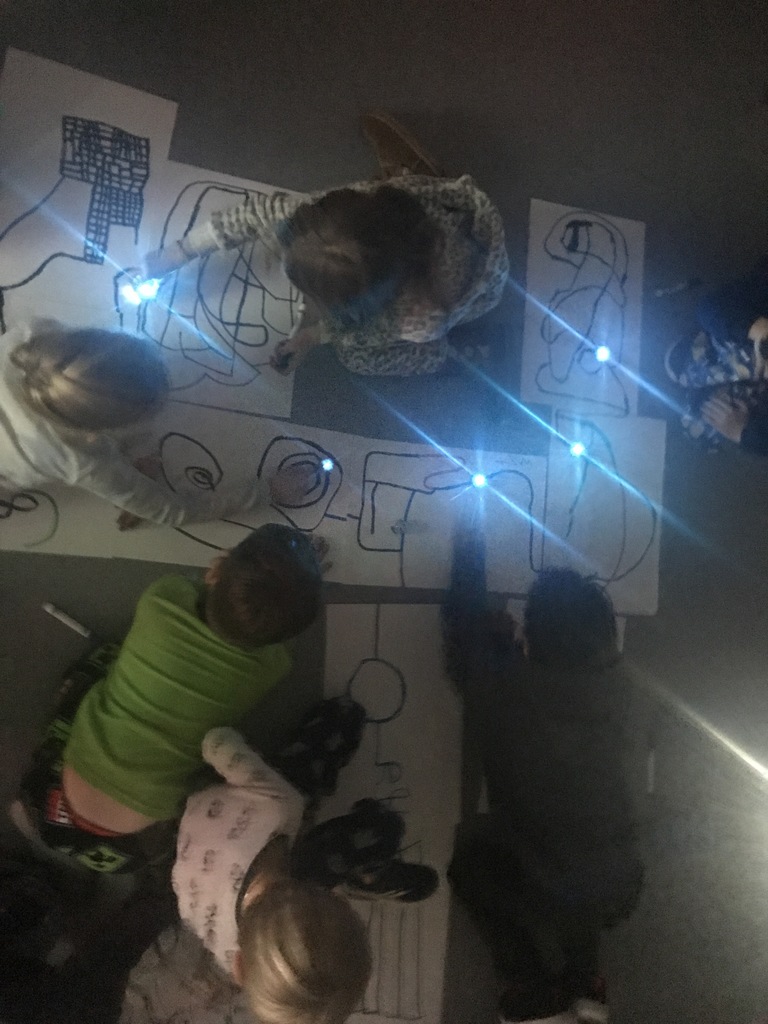 Students exploring Ozobots