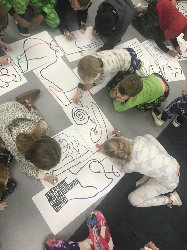 Students exploring Ozobots