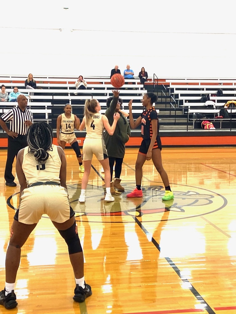 Jarnisha Savage tossing the jump ball