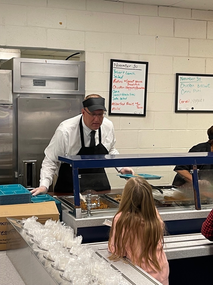 Dr. Raley serving lunch