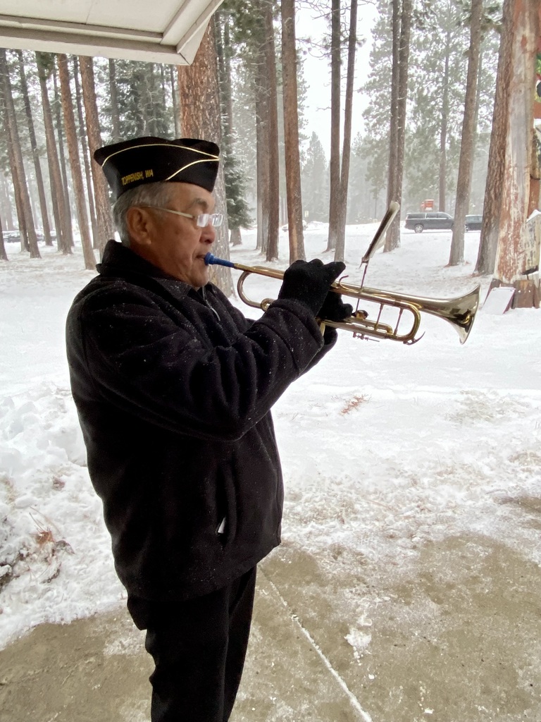 Warriors trumpet player playing TAPS