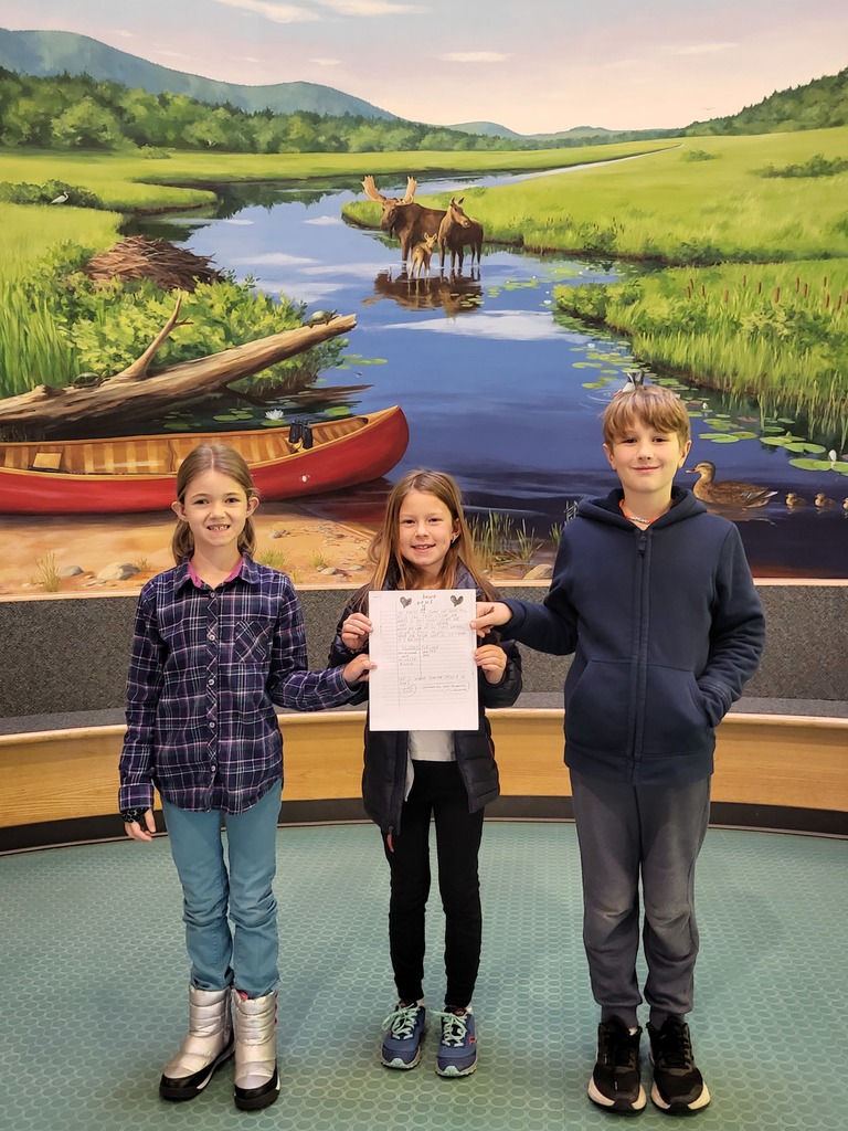 Editors and Guest Illustrator display their fist edition