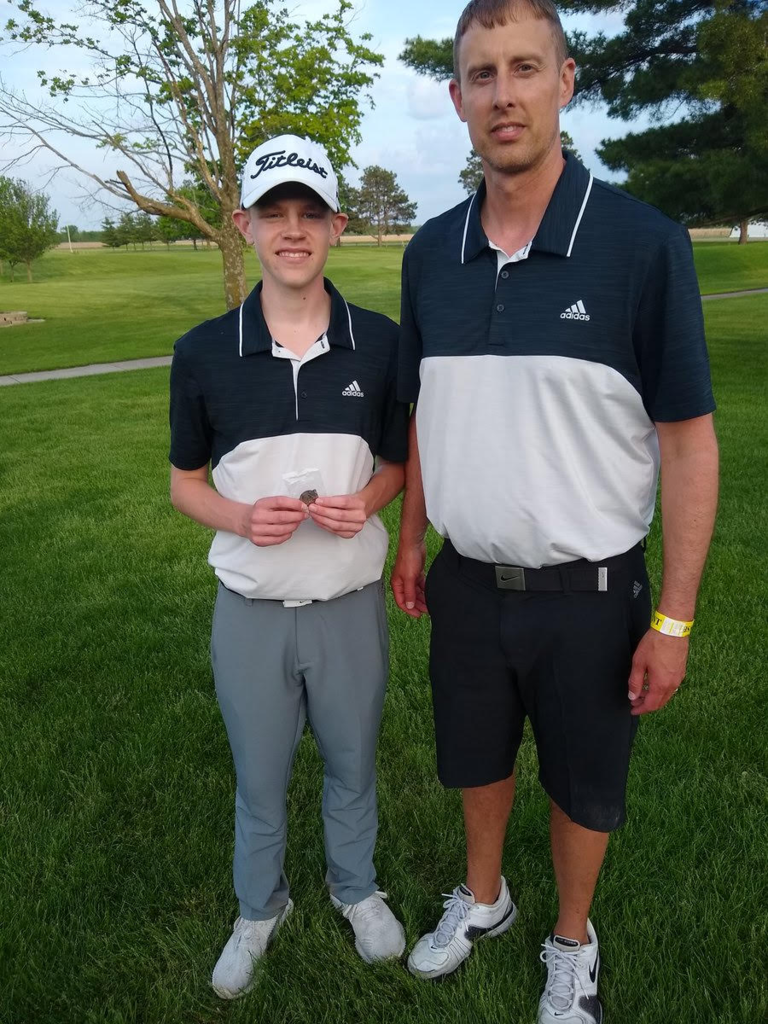 Coach Kelby Bender, right, stands with Noah Schlabaugh who qualified for State Golf