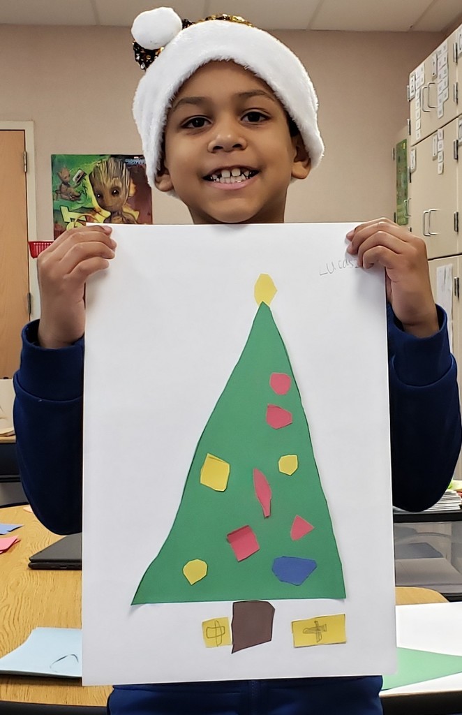 Student with Christmas tree