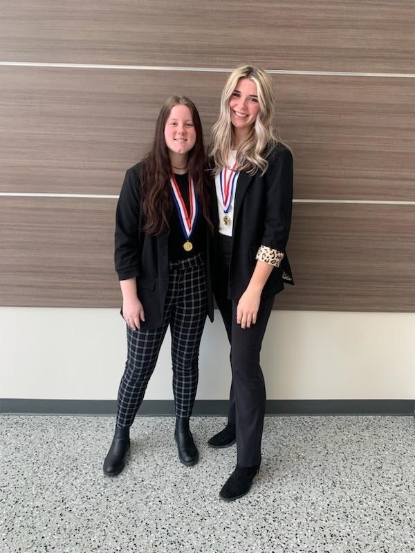 Taryn and Lydia receive Distinguished Superior rating for their duet, Fire Damage. 