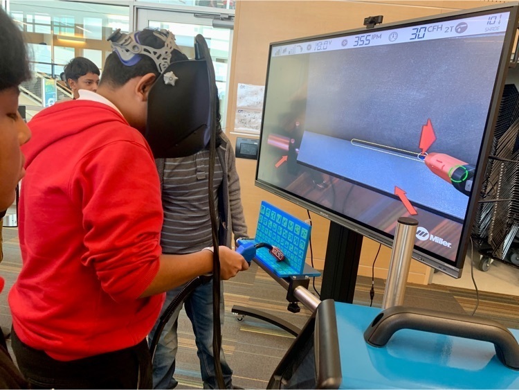 student using VR Welder