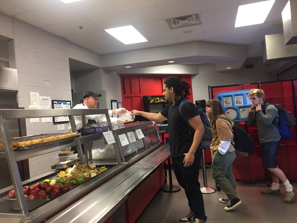 Dr. Raley serving breakfast
