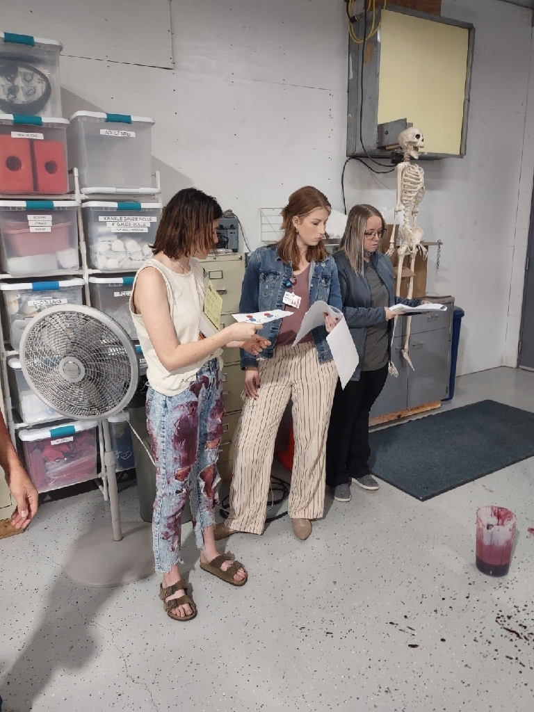 student discussing with hospital staff