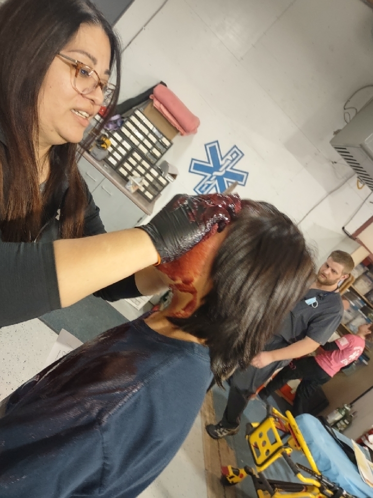 brin makeup being applied to students