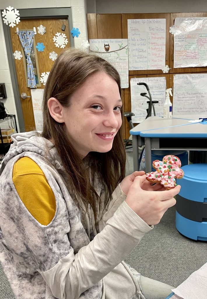 Student with gingerbread cookie