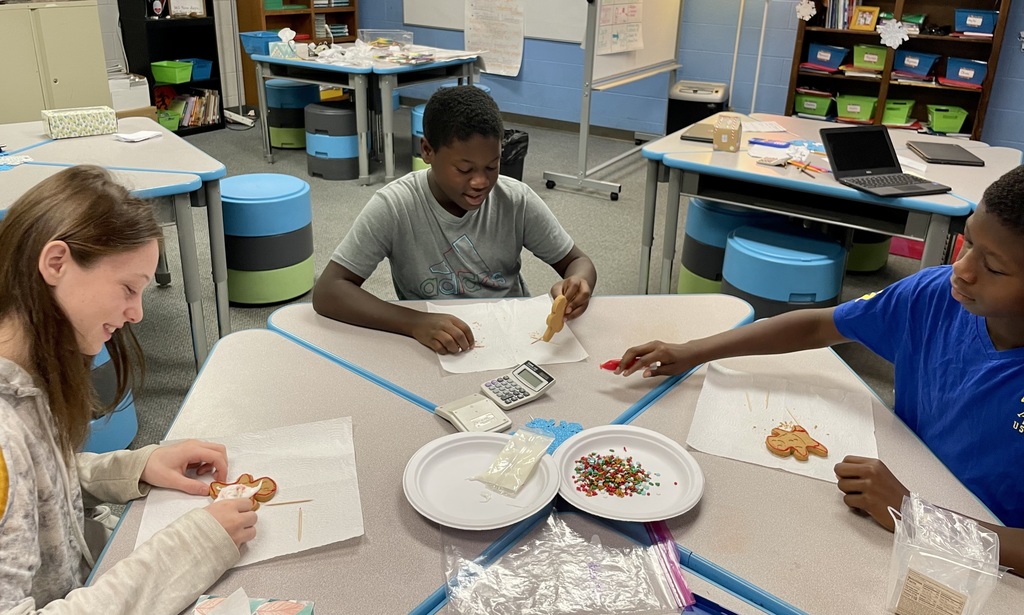 Students decorating cookies