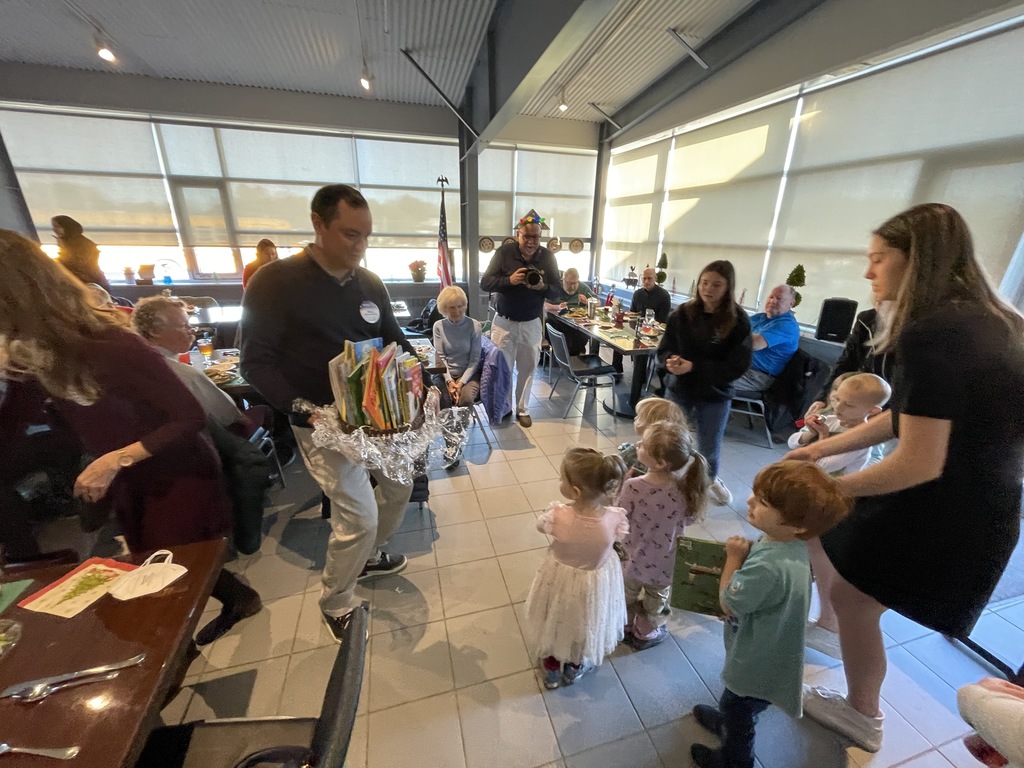 Westbrook Gorham Rotarians gifted books to our nursery school students