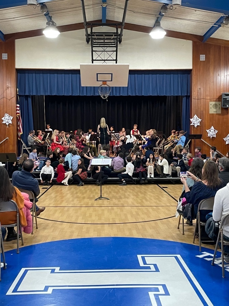Ms. M leading the band