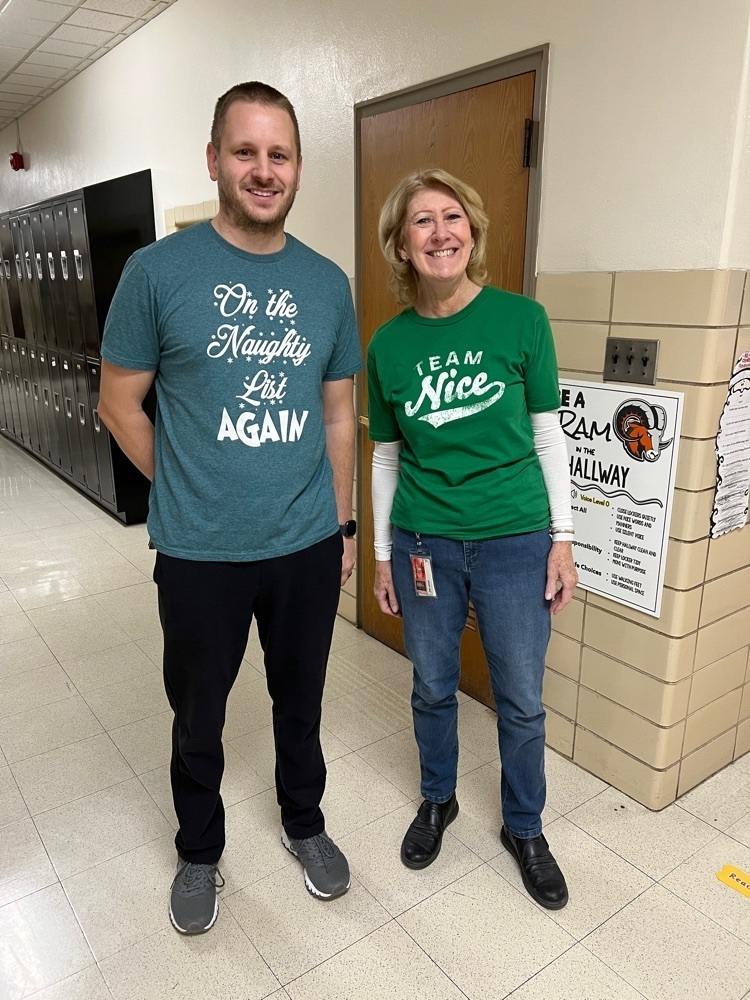 teachers with Christmas shirts