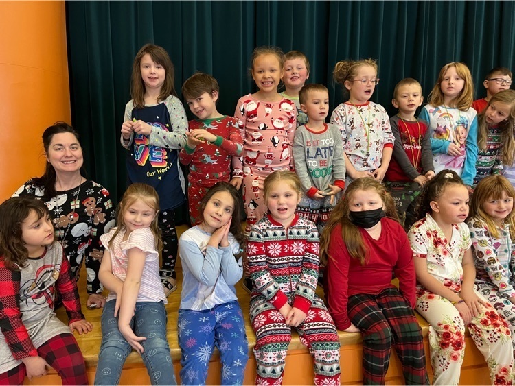 first graders and their teacher in pjs