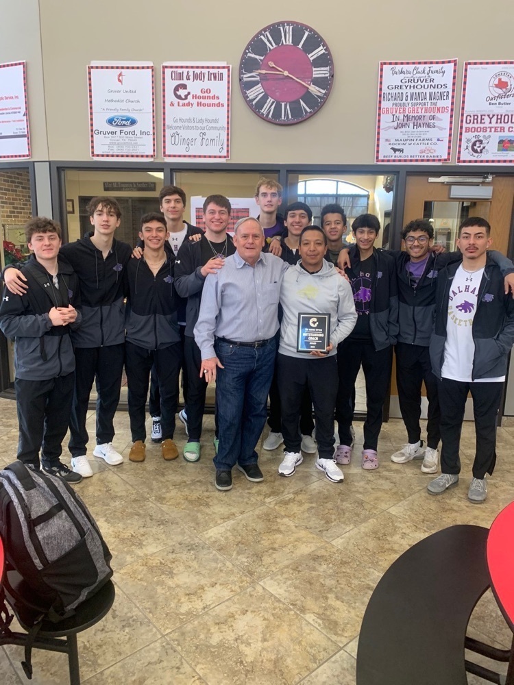 Coach Lopez receives the Wayne Tipton Outstanding Coach Award at the Gruver Tiurnament