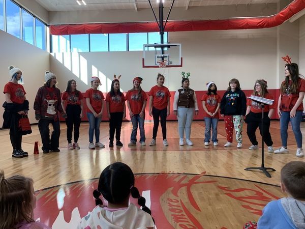 junior high choir visits elementary
