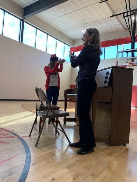 junior high choir visits elementary