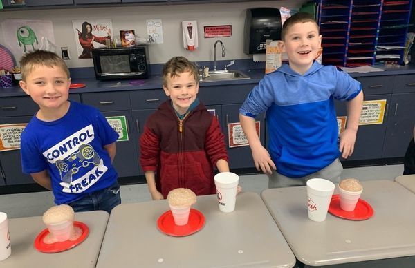 students doing science experiment