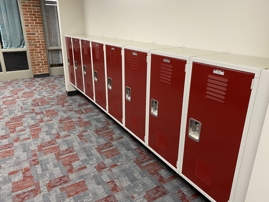 red school lockers in hallway